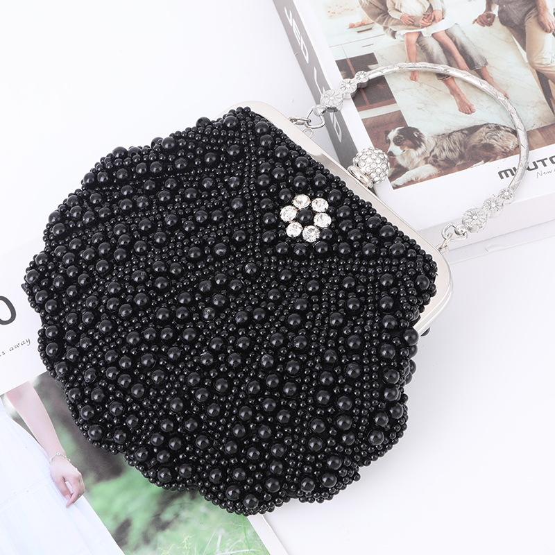 Luxuriöse Clutch mit gewellten – Luxury Bags Direct Bewertung und Preis